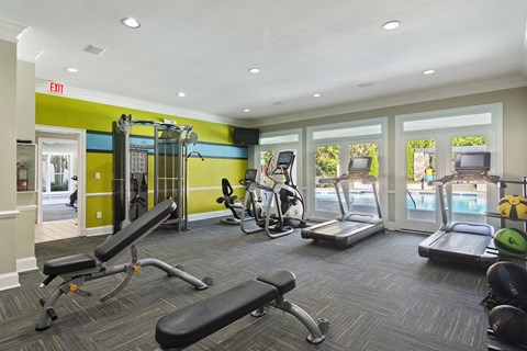 Fitness Center with Cardio Machines located at St. Andrews Apartments in Johns Creek, GA 30022